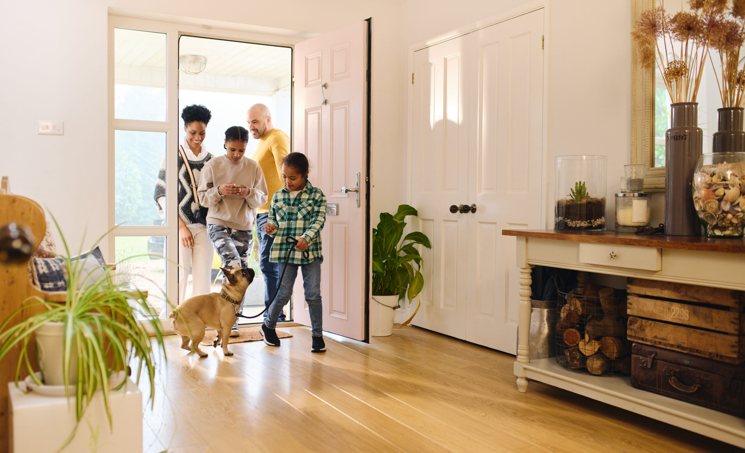 Dog at home with family during a private in-home training session